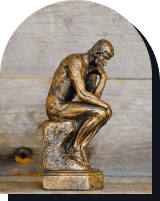 statue du penseur de Rodin en cuivre